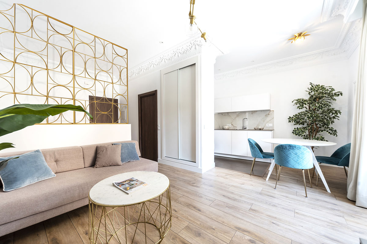 Cocina Santos y sala de estar en apartamento turístico
