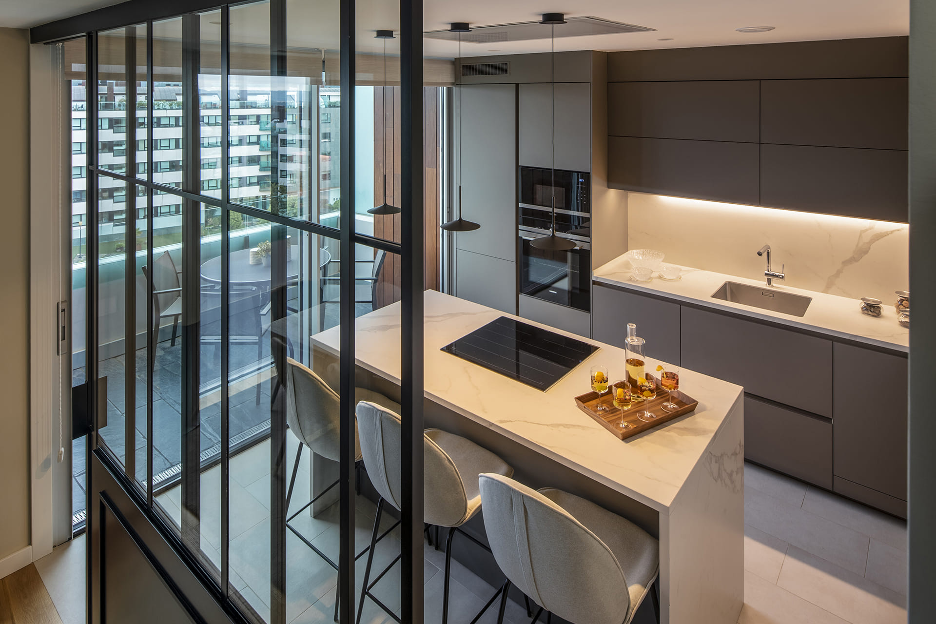 Black enclosure to separate the kitchen from the living room