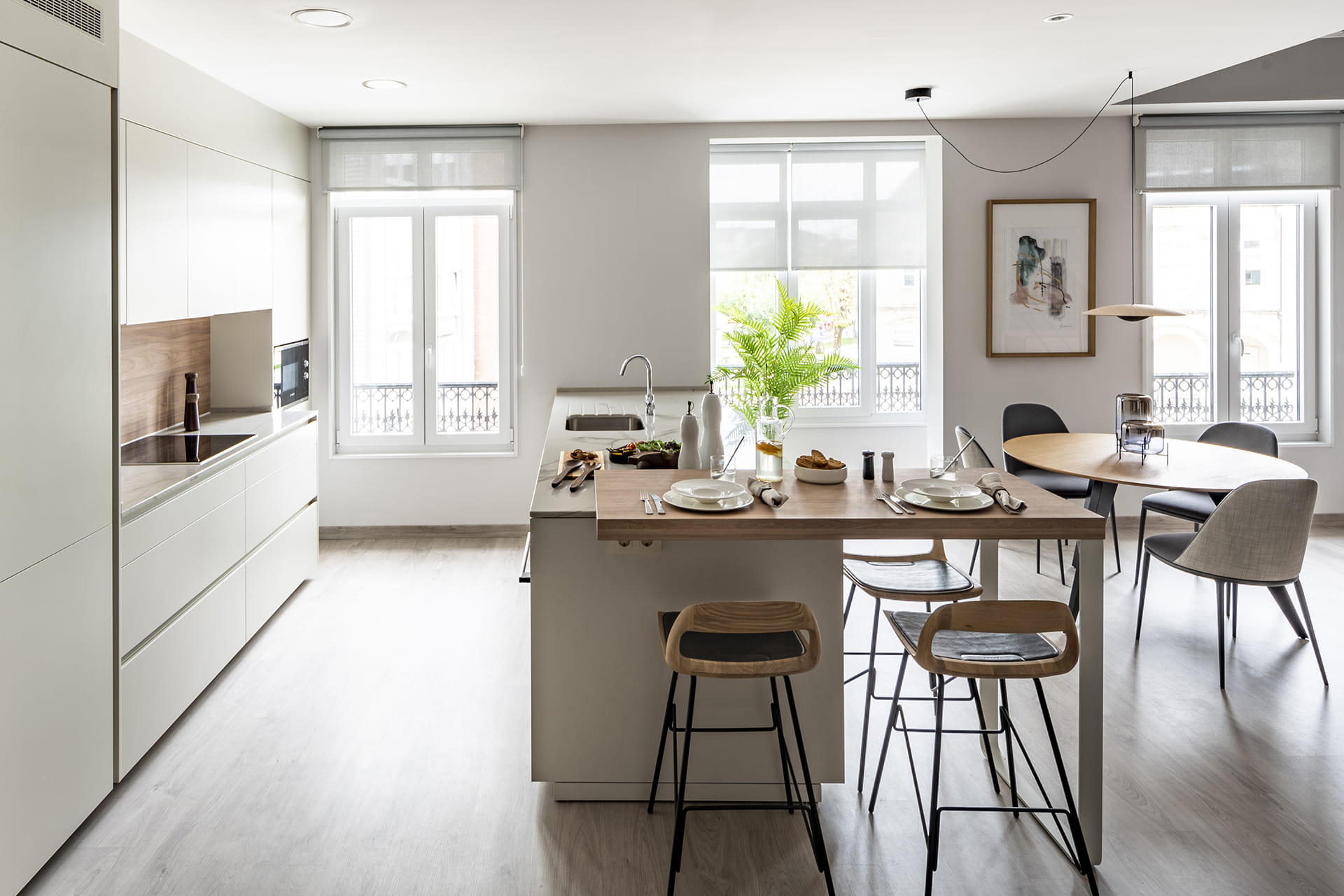 Functional, white centre island by Santos kitchens
