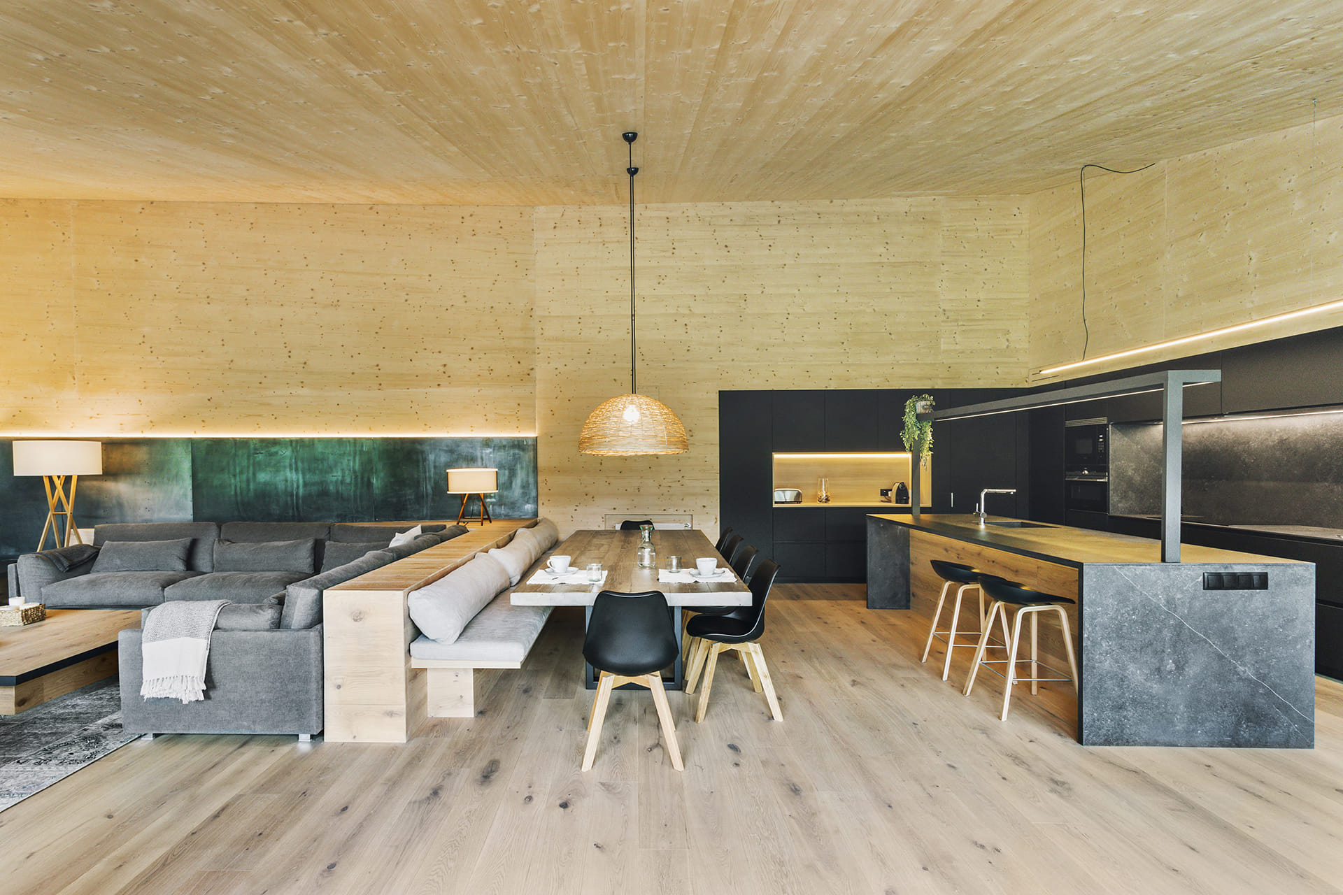 Open-plan Santos kitchen in black and wood