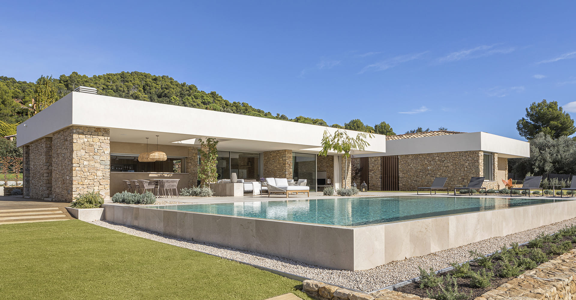 Exterior of a rustic-style home by DOM Arquitectura
