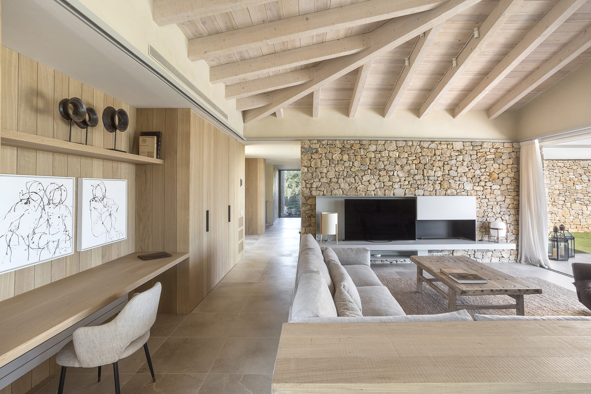 Open-plan living room in rustic home