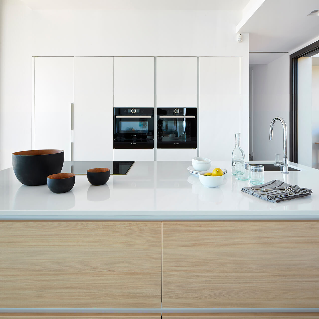 Santos kitchen with island and white units