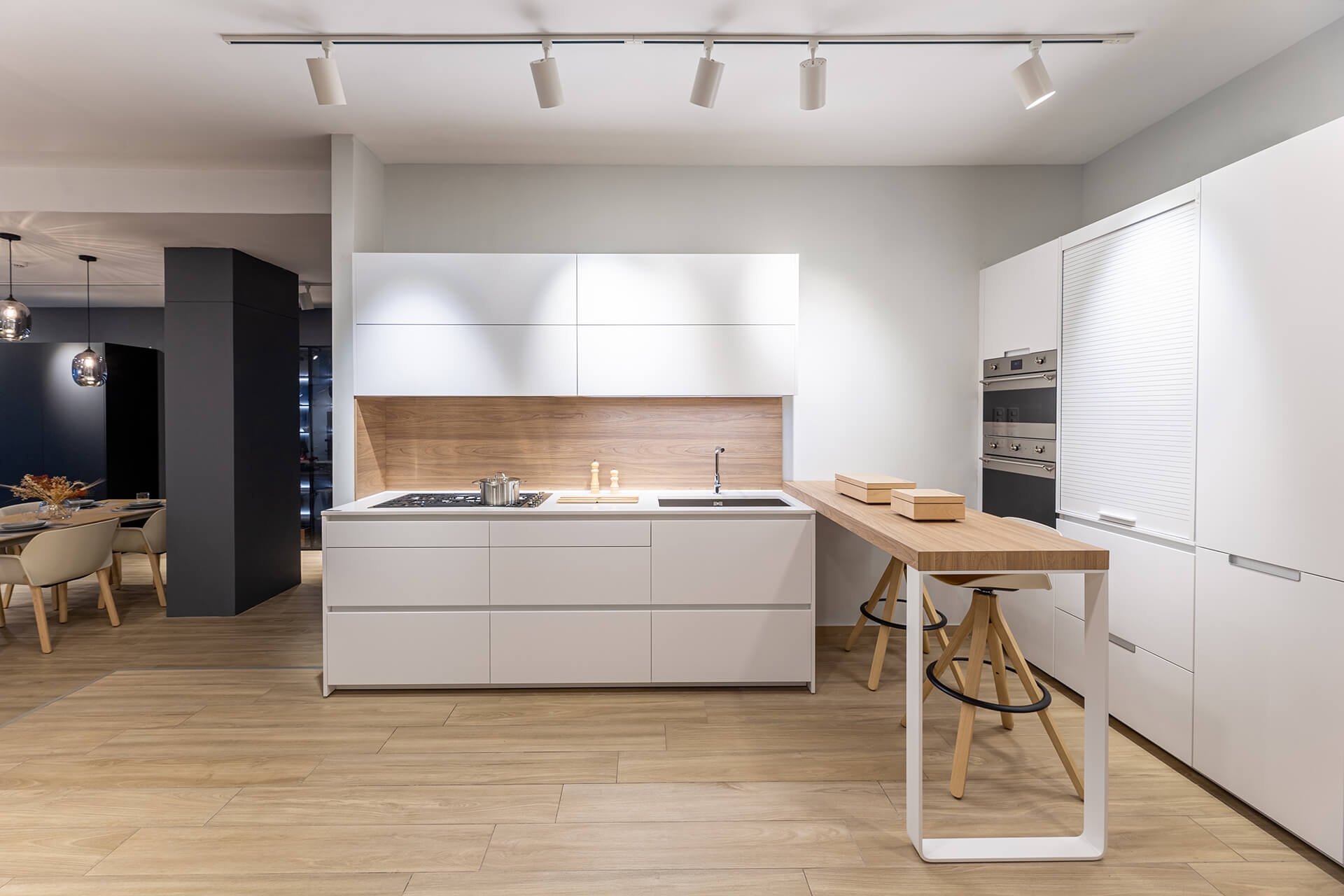 L-shaped white kitchen Santos Kitchens in Lima