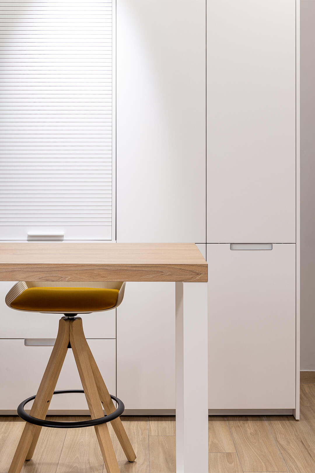 Row of white cupboards Santos Kitchens in Lima