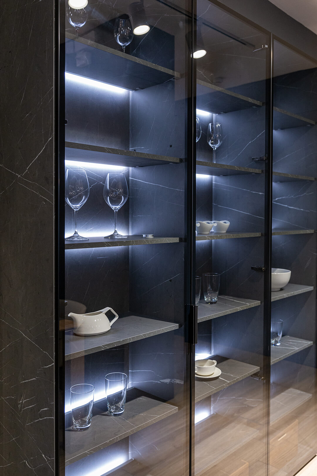 Glass door unit finished in marble Cocinas Santos Lima in Peru
