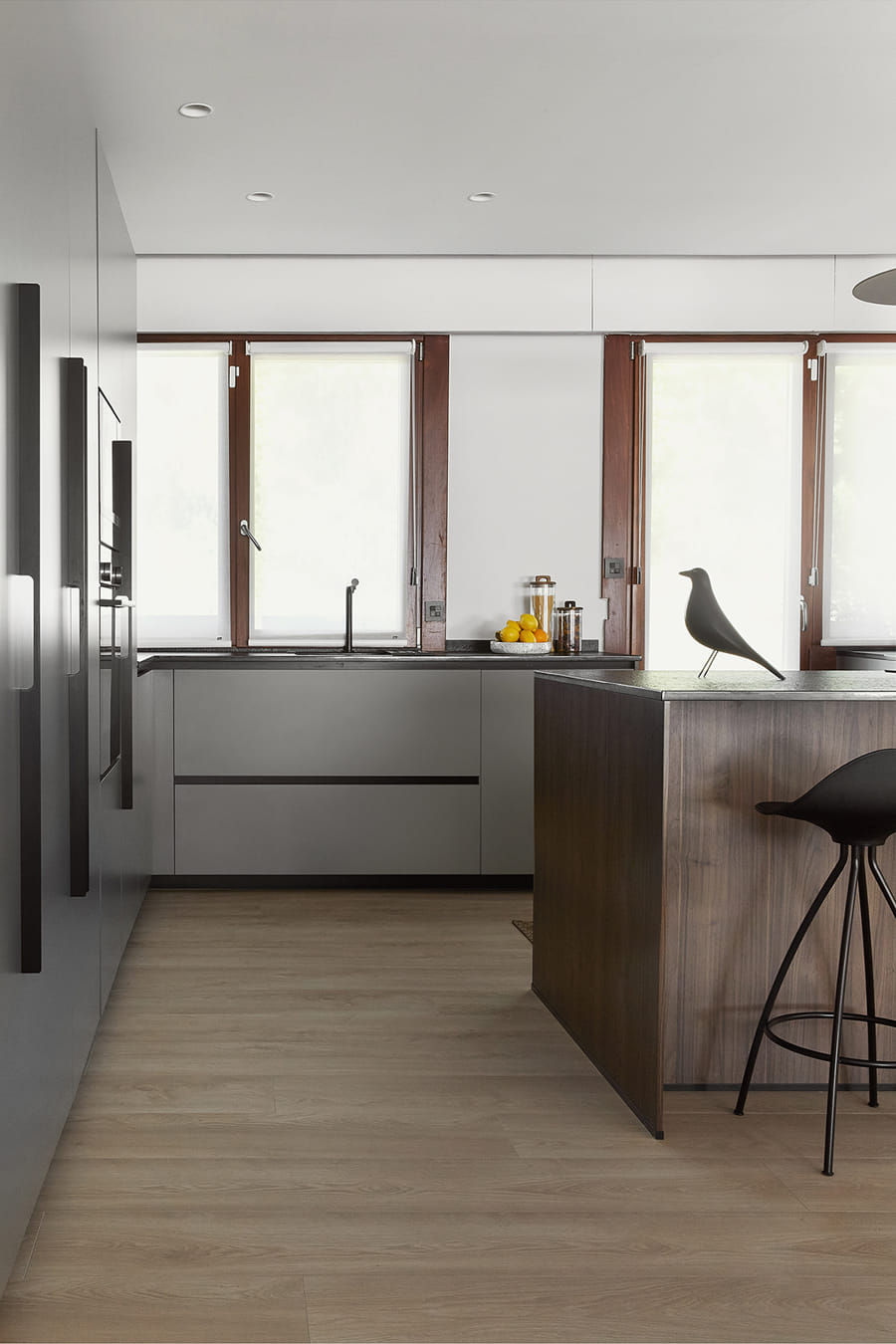 Grey Santos kitchen with centre island and grey tall units, plenty of storage.