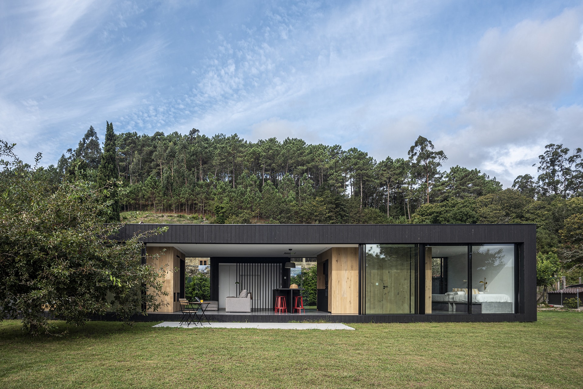 Black Santos kitchen open to the outside