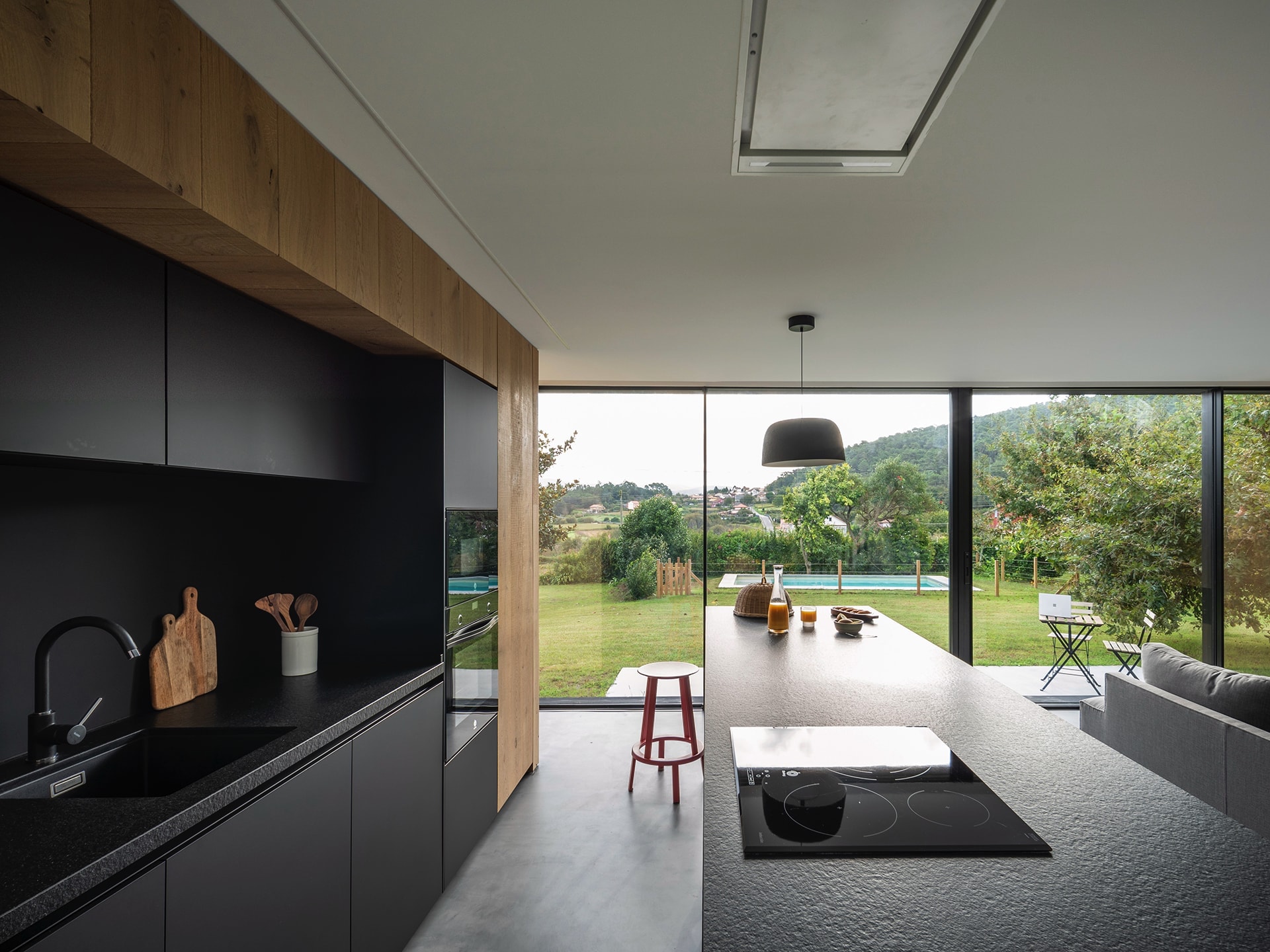 Muebles de cocina en paralelo a la isla Santos