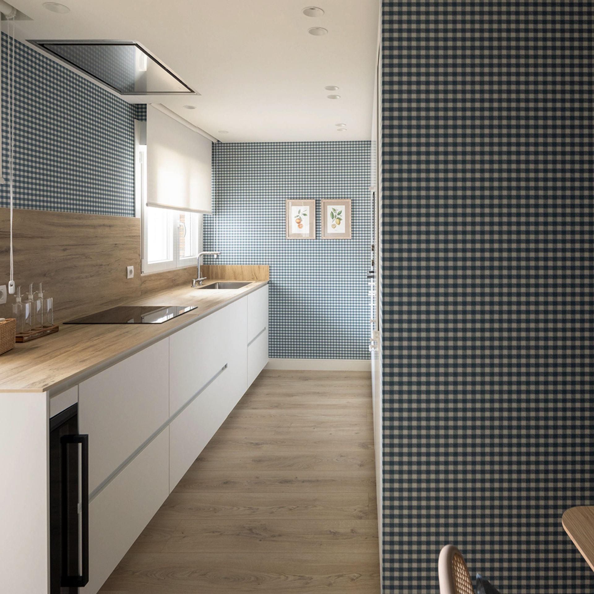 Parallel, white Santos kitchen with eat-in area.