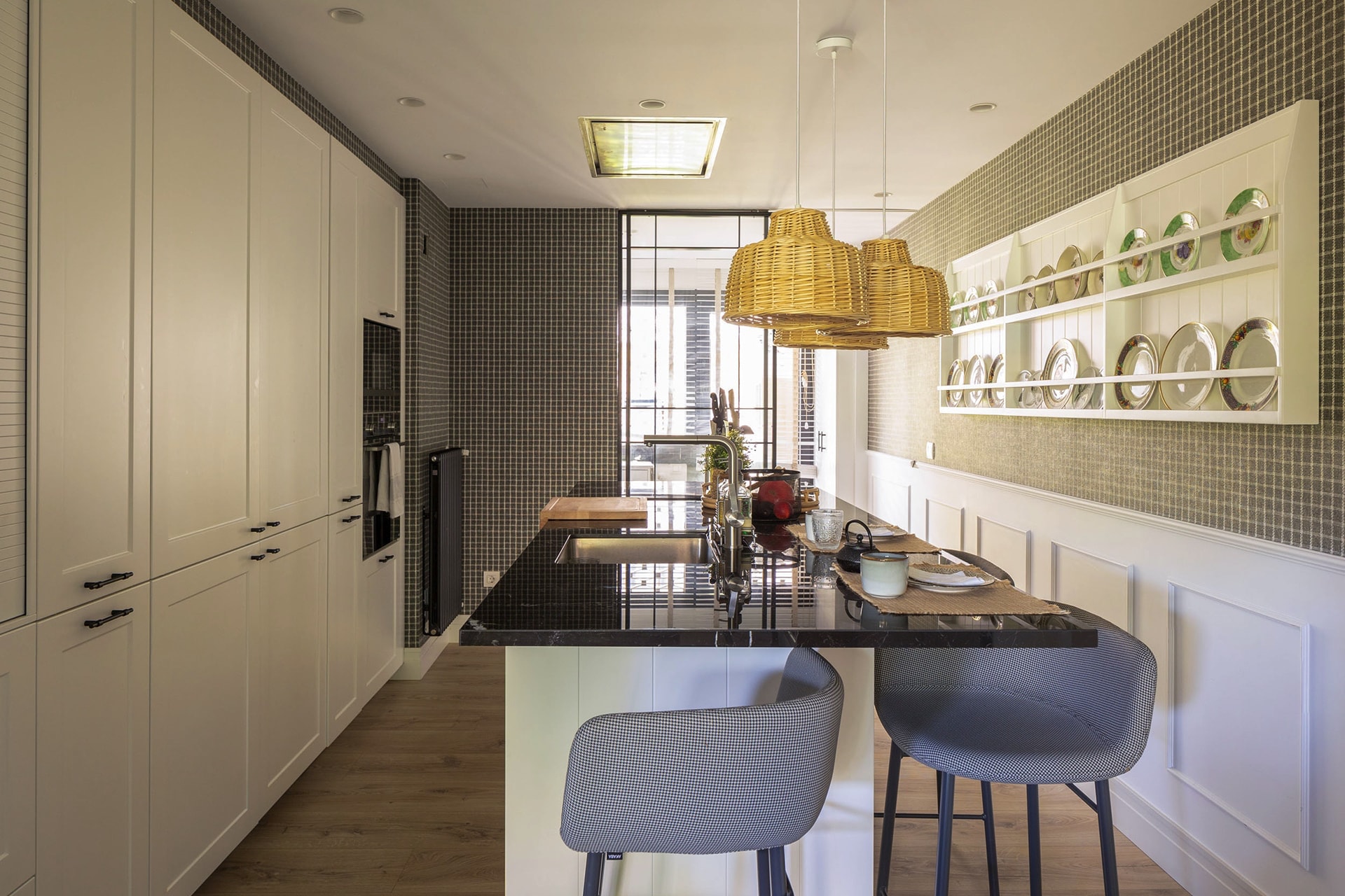 Santos kitchen with island in black and white.