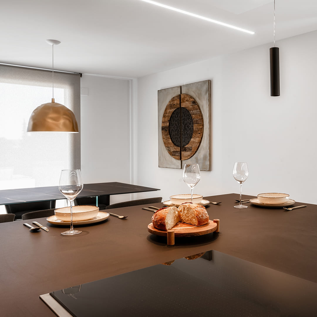 Kitchen island with counter open to the lounge in a Santos Kitchens renovation project.
