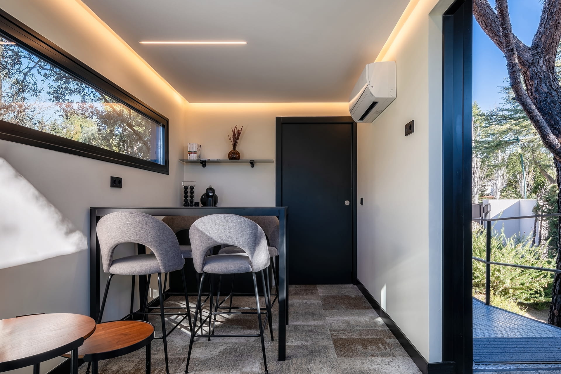 Work area in a container-based building in a renovated house with a Santos kitchen.