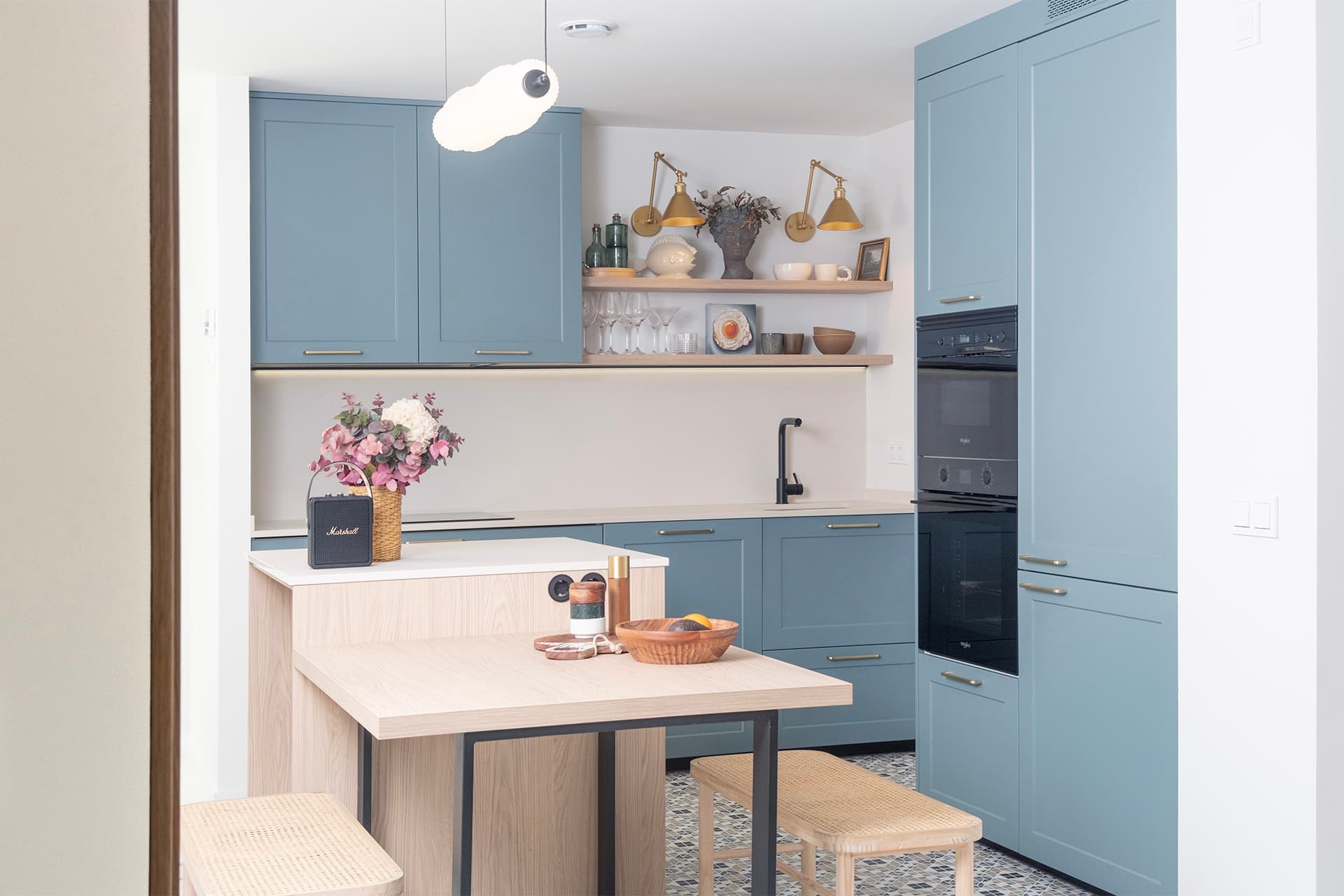 Blue and white kitchen designed by Santos Kitchens.