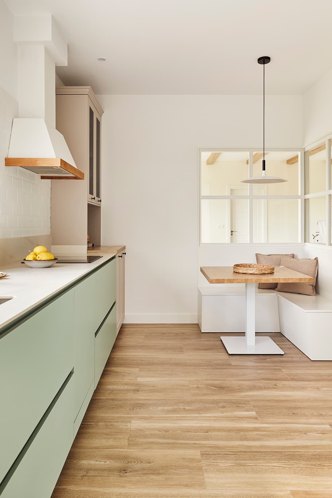 White and green kitchen designed by Santos Kitchens.