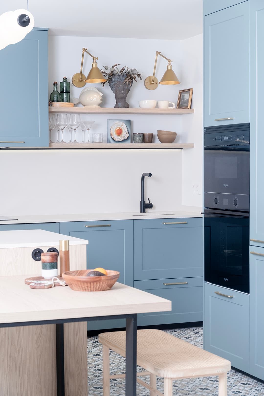 Blue kitchen cabinets in a kitchen designed by Santos Kitchens.