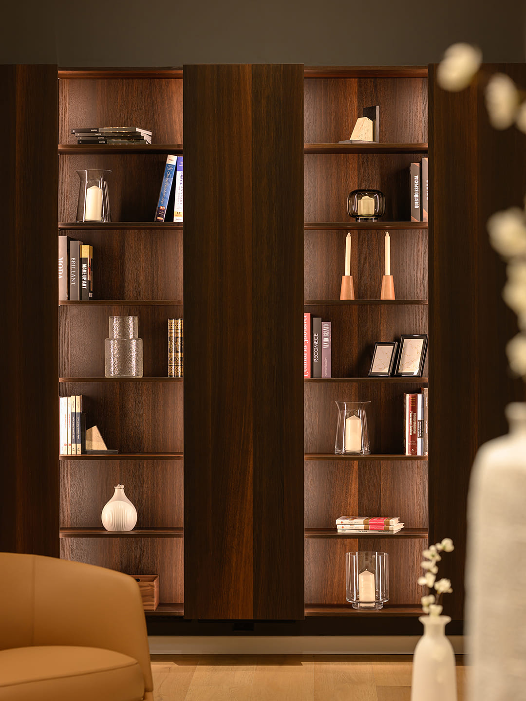 Cupboard and shelves with interior lighting at the Santos Kitchens showroom in Riyadh.