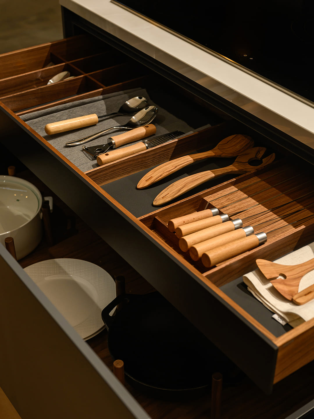Close-up of the drawers in the kitchen island at the Santos Kitchens showroom in Riyadh.