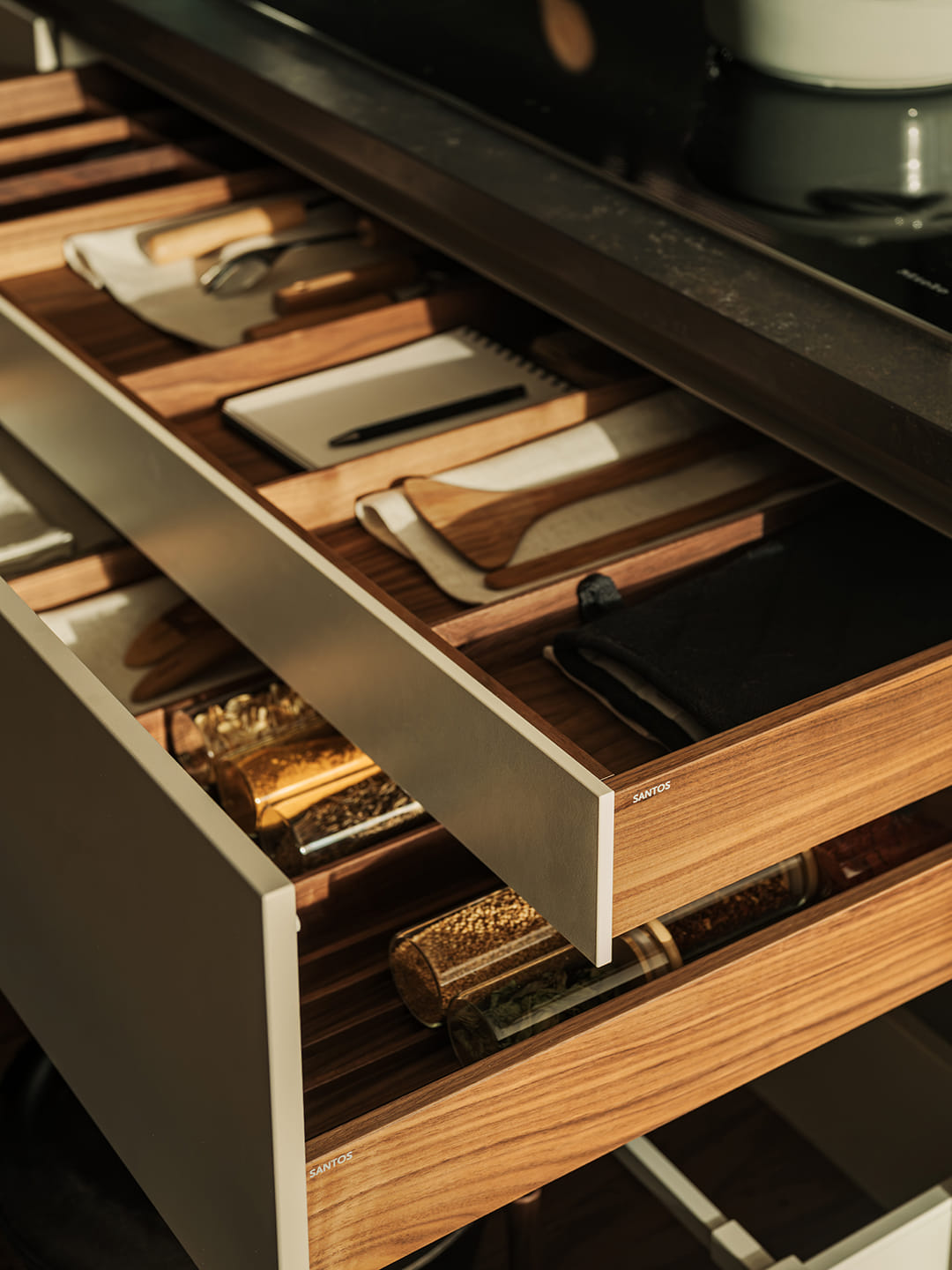Drawers integrated into a kitchen island on display at the eba Riyadh showroom.