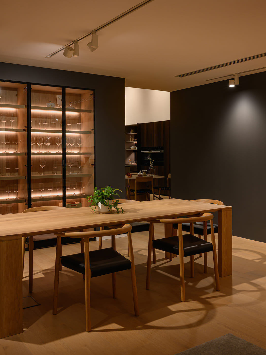 Dining area with glass door unit at the Santos showroom in Saudi Arabia.